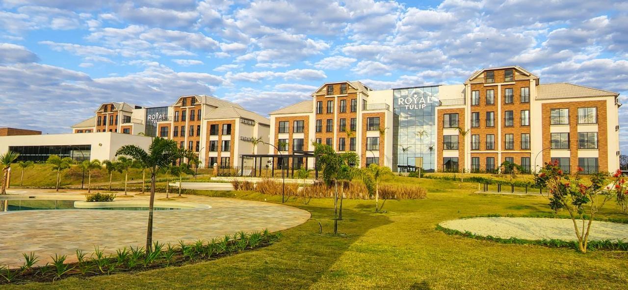 Royal Tulip Holambra Hotel Exterior photo Residential buildings at the University of Rwanda